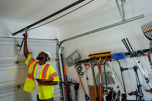 Professional Garage Door technician working in Everman, TX